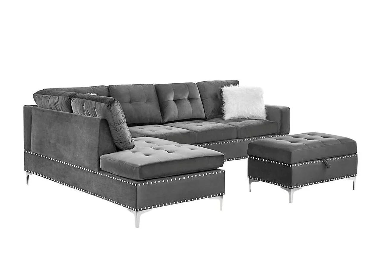 Detail close-up of tufted velvet upholstery and nailhead trim on Joy sectional