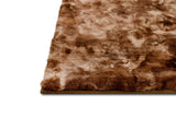 Rabbit Chocolate Medium Rug displayed in living room setting