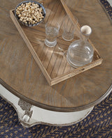 Realyn White/Brown Coffee Table with 2 End Tables — detail view