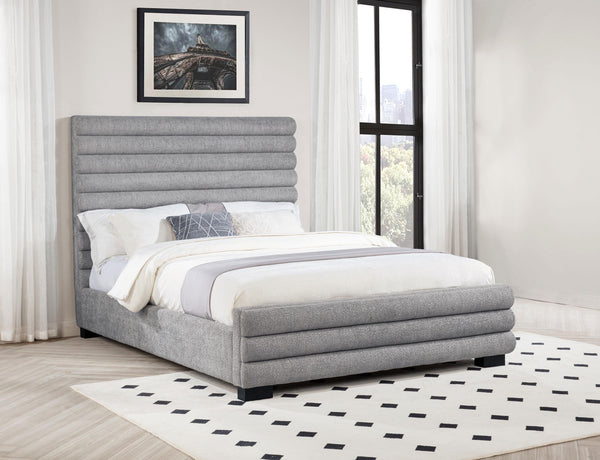Side angle view of Patricia 58-inch boucle upholstered queen bed