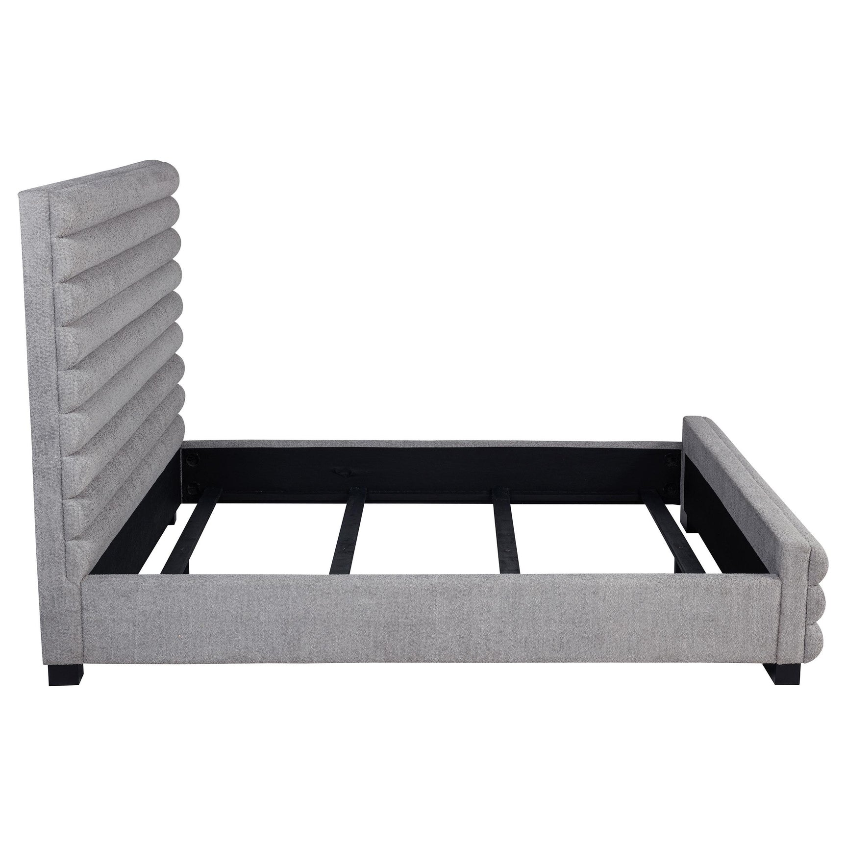 Detail of foam padding under grey boucle fabric upholstery