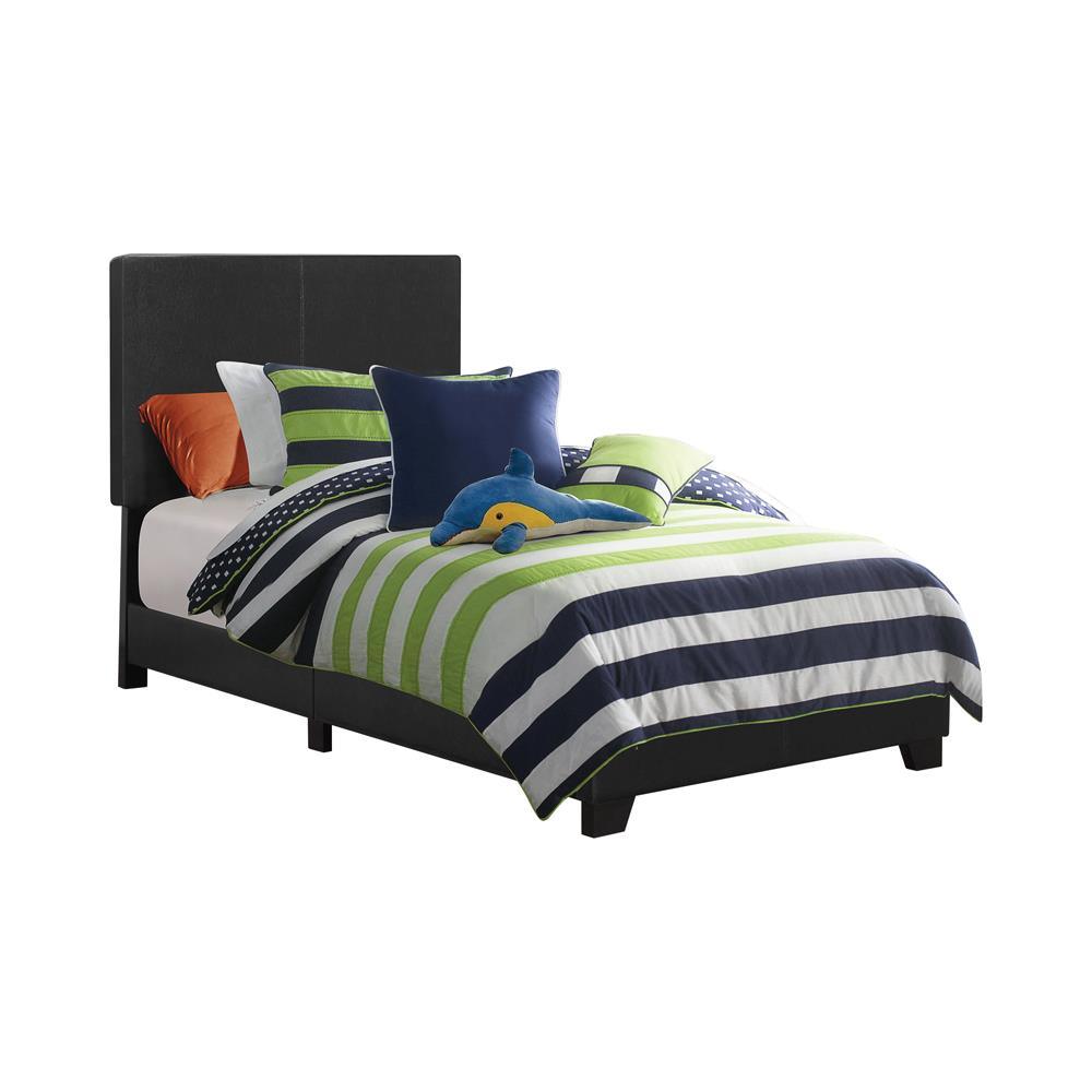 Dorian black upholstered twin bed side view showing tapered legs