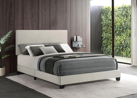Dorian queen bed side angle showing black finished legs