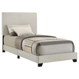 Close-up of cream fabric padded headboard on Dorian twin bed