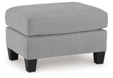 Side angle of Adlai Shadow Chair and Ottoman in shadow color