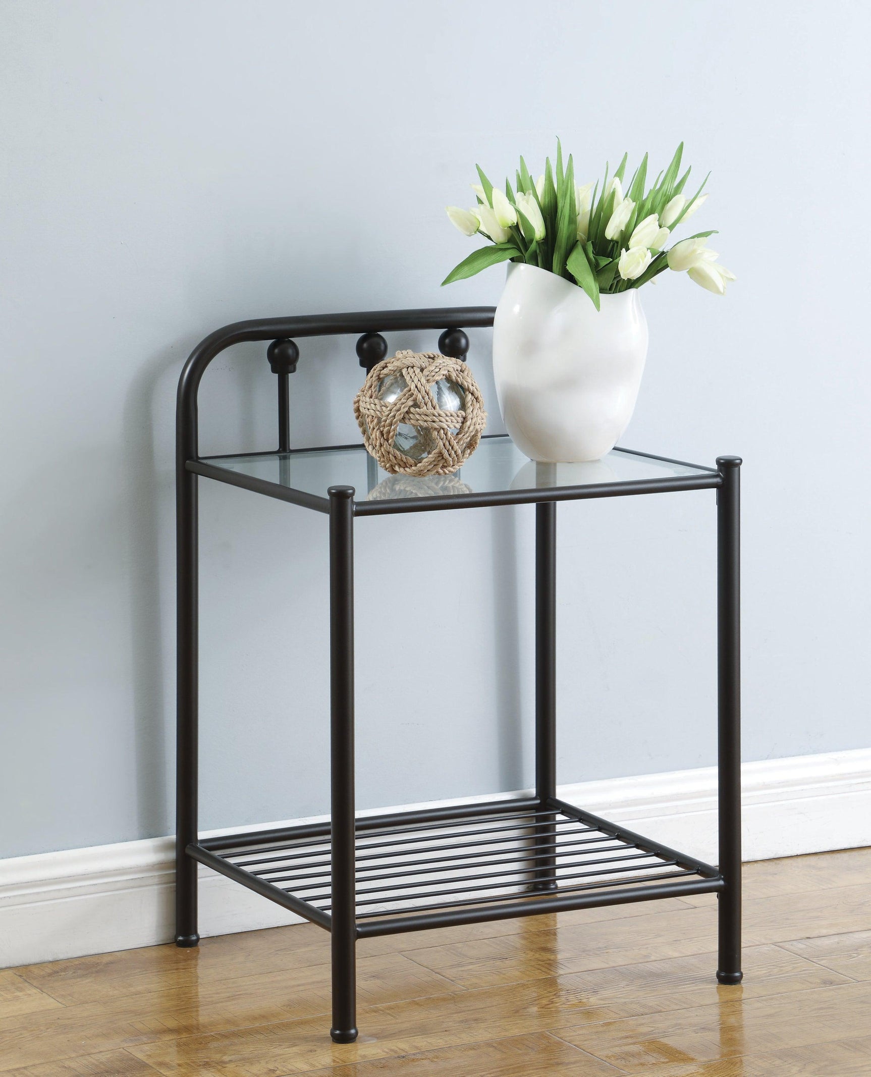 Close-up of Livingston Twin Bed dark bronze metal scrolling