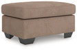 Triston-Peaks Ottoman angled view showing upholstery and legs