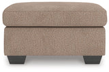 Triston-Peaks Ottoman front view with visible cushion detail