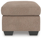 Triston-Peaks Ottoman side profile highlighting fabric texture
