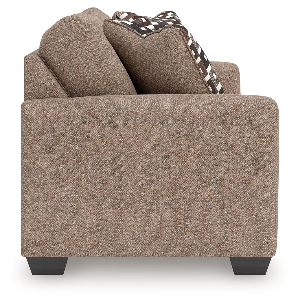 Triston-Peaks loveseat side view showing arm and cushion