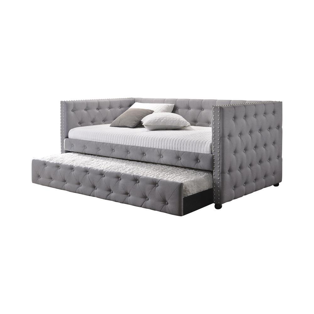 Close-up of tufted grey fabric upholstery on Mockern daybed
