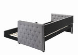 Angle showing tufted mattress and daybed frame in grey