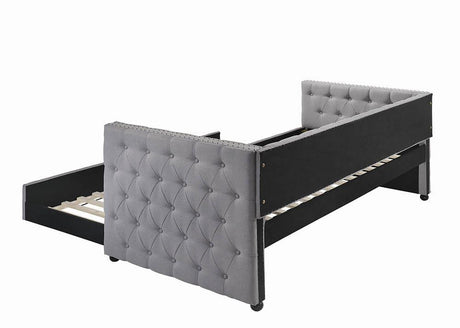 Angle showing tufted mattress and daybed frame in grey