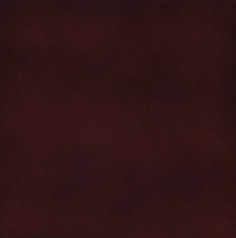Close-up of twist center design on Riona coat rack in merlot