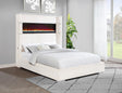 Side angle of Tisdall Upholstered Cal King Bed showing cream upholstery