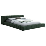 Side angle of Trinity Upholstered Eastern King Platform Bed in spruce fabric