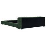 Detail of platform bed frame with fabric upholstery