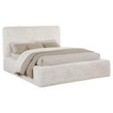 Side view of Rebecca cream upholstered queen bed