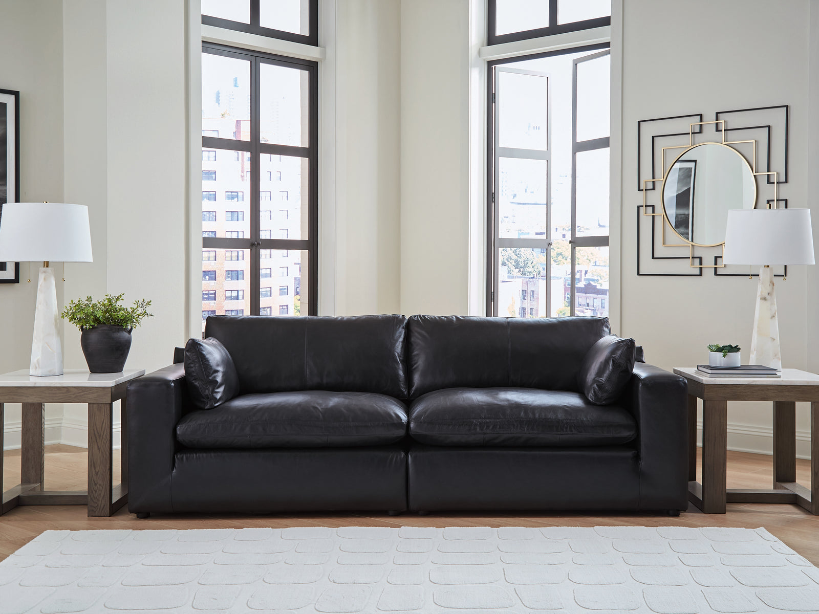 main view of Emilia Black Leather 2-Piece Sectional Loveseat sectional sofa