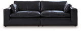 Emilia Black Leather 2-Piece Sectional Loveseat side view showing leather upholstery