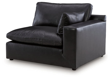 Main angle view of black Emilia Sofa and Loveseat