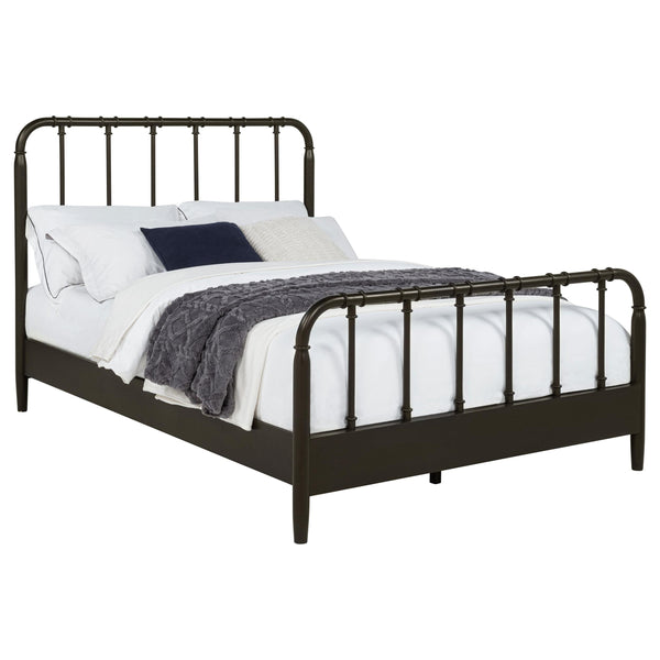 Side angle of Rocco Eastern King Bed showing slender spindles and ring accents