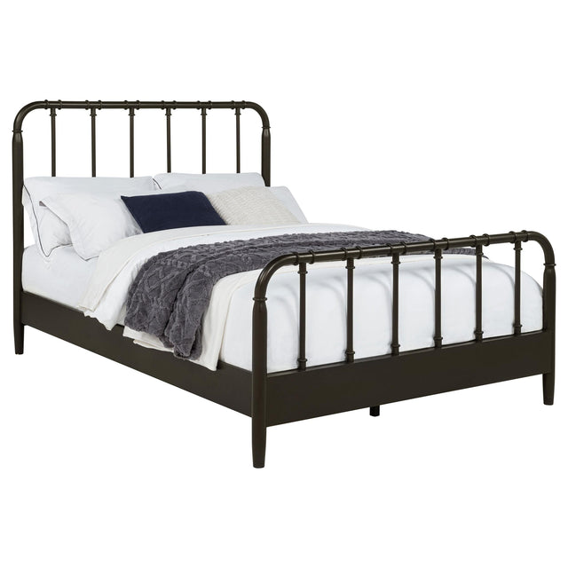 Side angle of Rocco Eastern King Bed showing slender spindles and ring accents