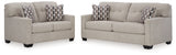 Close-up detail of pebble fabric upholstery on Mahoney set