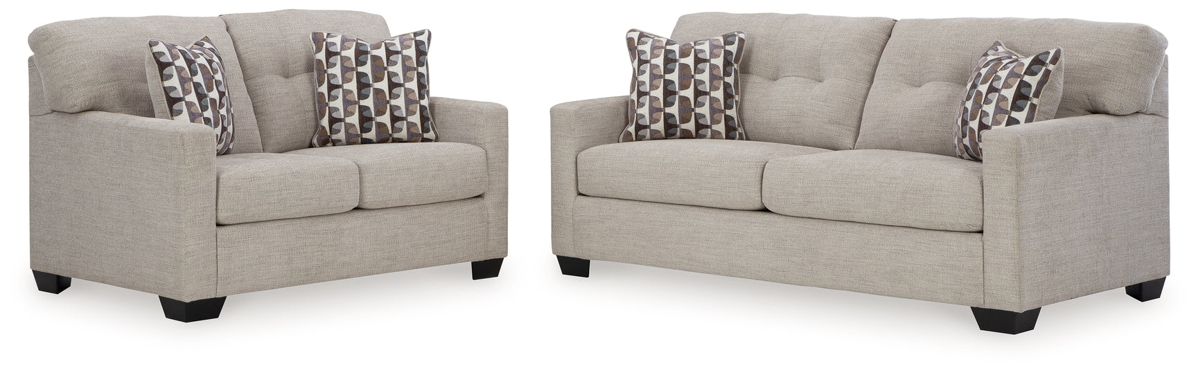 Close-up detail of pebble fabric upholstery on Mahoney set