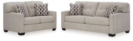 Close-up detail of pebble fabric upholstery on Mahoney set