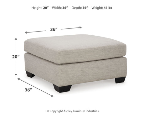 room view of Mahoney Pebble 2-Piece Sectional with Ottoman sectional sofa arrangement