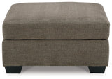 side view of Mahoney Chocolate 2-Piece Sectional with Ottoman sectional sofa