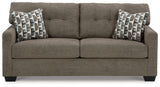 Side angle view of Mahoney Chocolate Sofa and Loveseat