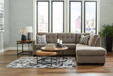 Room setting with Mahoney Chocolate 2-Piece Sectional Sofa with Chaise