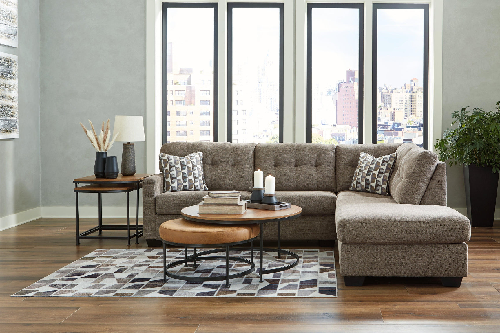 Room setting with Mahoney Chocolate 2-Piece Sectional Sofa with Chaise