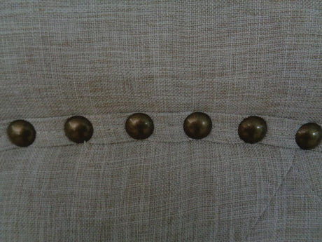 Sonoma Beige Upholstered Camelback Queen Bed - Detail of fabric texture and frame construction