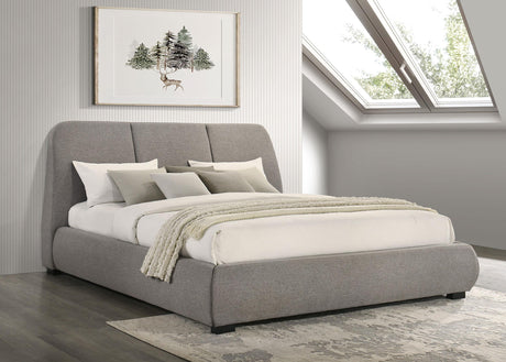 Side view of Mokena Eastern King Upholstered Platform Bed in taupe fabric