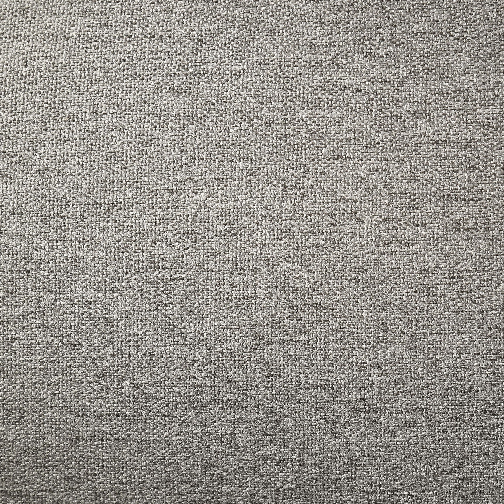 Curved flared headboard of upholstered bed