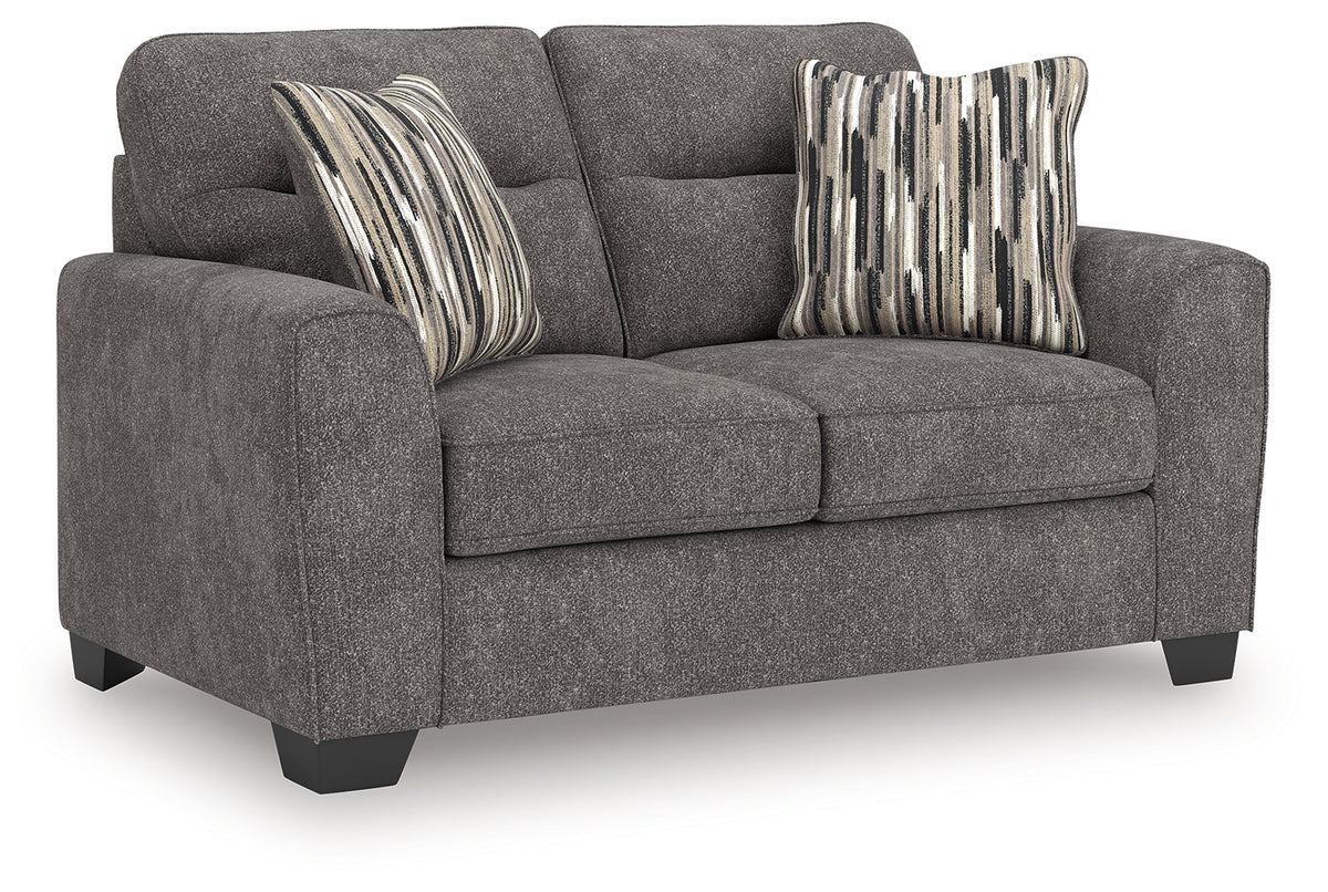 Olten Loveseat close-up side angle showing fabric texture and pillow