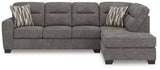 head-on room view of Olten Graphite Chenille 2-Piece Sectional with Chaise