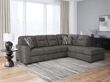 side angle showing chaise on Olten Graphite sectional sofa