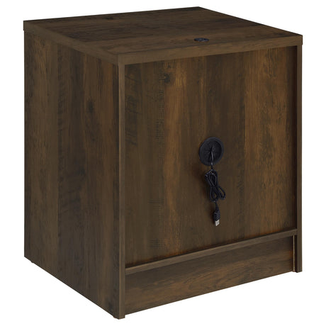 Drawer handle detail on dark pine nightstand