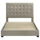 Close-up of grid-tufted leather headboard on Medley queen bed