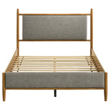 Bed frame showing wood finish and upholstery