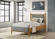 Mason platform bed headboard close-up with grey upholstery