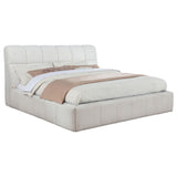 Close-up of Nollet bed's plush fabric and tufted headboard