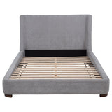 Walnut-toned rubberwood leg detail on Rennes bed