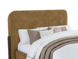 Close-up of the curry fabric upholstery and wooden leg of Baldacci bed