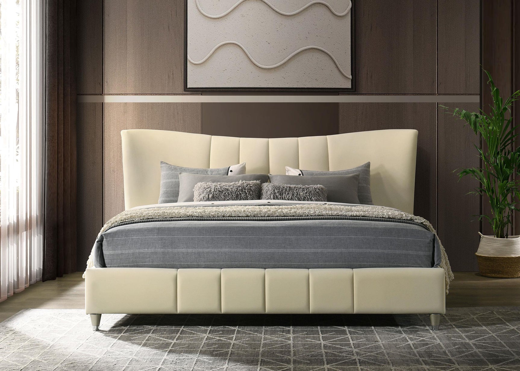 Evelyn upholstered bed gold legs detail