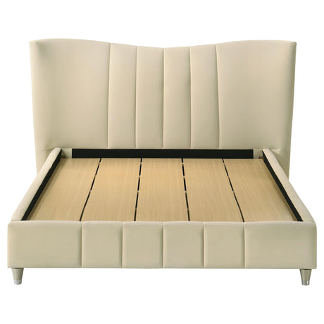 Polished gold wooden leg of Evelyn bed